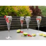 Champagneglass med bobler og bær