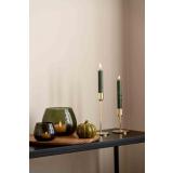 Kronelys grønn i lysestake på konsollbord 