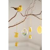 Gren med glassegg, kaninger og fugl på klype