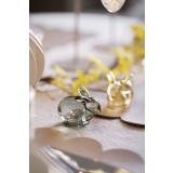 Kaninfigur i glass på spisebord