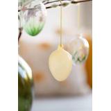 Glassegg gul på gren gåsunger