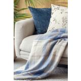 Pledd Tartan liggende på sofa