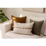 Puter i brun, beige og grønn i soffa