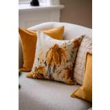 Putetrekk i sofa i fargene oker gul og beige