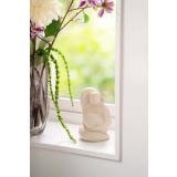 Figur dame i vinduskarm