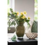 Vase med grønn og gul bukett