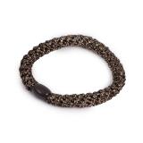 Hårstrikk i sort og gull