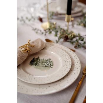 Asjett Julemagi på dekt bord nærbilde