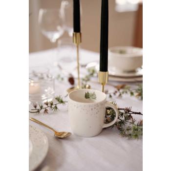 Kopp Julemagi på dekt julebord