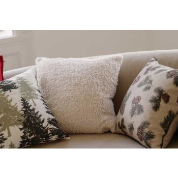 Putetrekk med naturmotiv satt sammen med teddypute