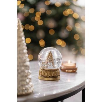 Snøkule Teddy på sofabord med duftlys