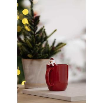 Kopp med nisse på kanten