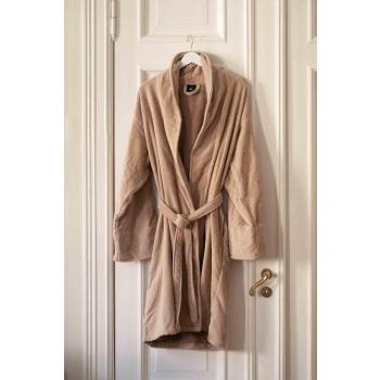 Badekåpe hengende på dør