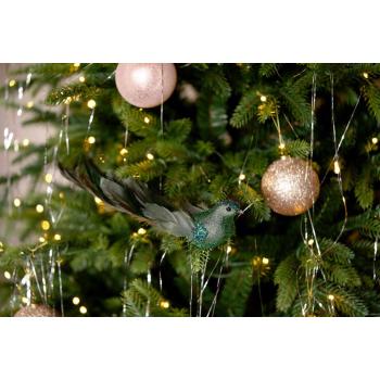 Fugl på klype Glam i juletre nærbilde