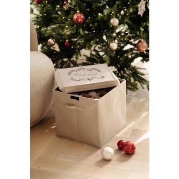 Oppbevaringsboks med julekuler ved juletre