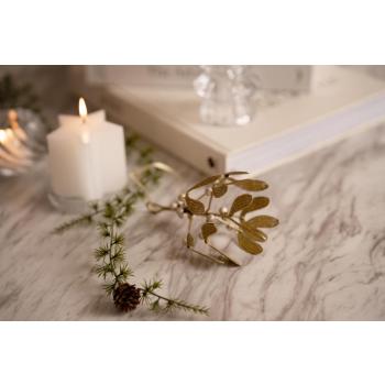 Dekormisteltein på bord med lysfat og kubbelys