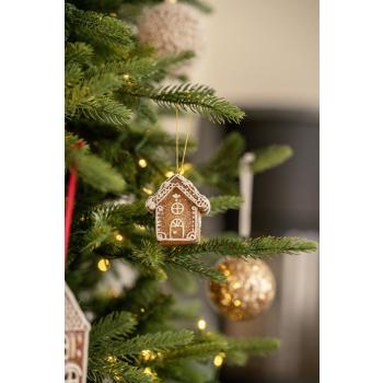 Pepperkakehus hengende i juletre