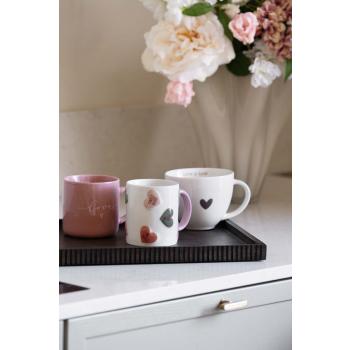 Kjærlighetskopper på lysfat rille