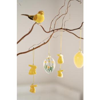 Gren med glassegg, kaninger og fugl på klype