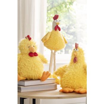 Påskehøner sittende på et sofabord