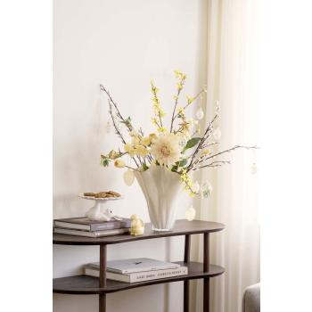 Gren gåsunger med glassegg i vase på konsollbord ethan