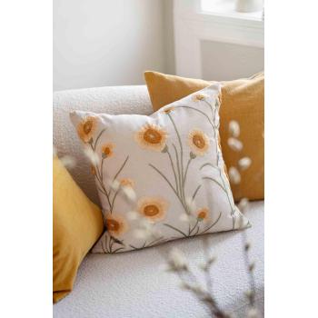 Brodert putetrekk med matchende puter i gul