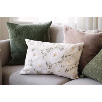 Putetrekk Bianca bak putetrekk daisy i sofa