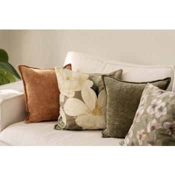 Putetrekk i velur i grønn og brun i sofakrok