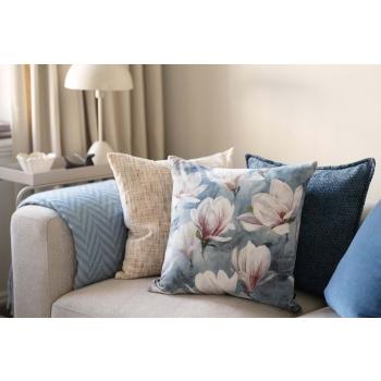 Putetrekk i blå og beige farger i sofakrok