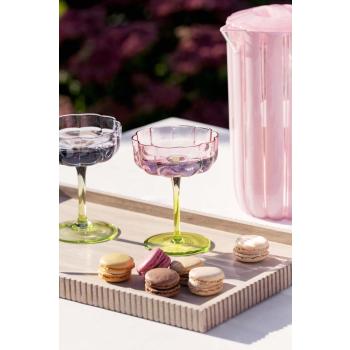 Champagneglass flower servert på lysfat rille