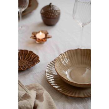 Tallerken Bloom og skål Bloom på spisebord