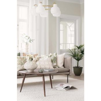 Sofabord Yana stylet med vase i grønn og beige stue