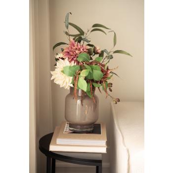 Stilkblomst Dahlia i oppsats i vase